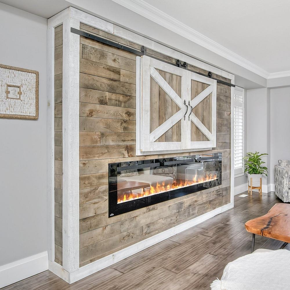 Rustic barn-door media wall with long linear fireplace in a bright living room