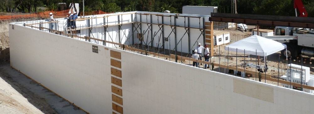 Insulated concrete forms stacked and braced, ready for steel and concrete