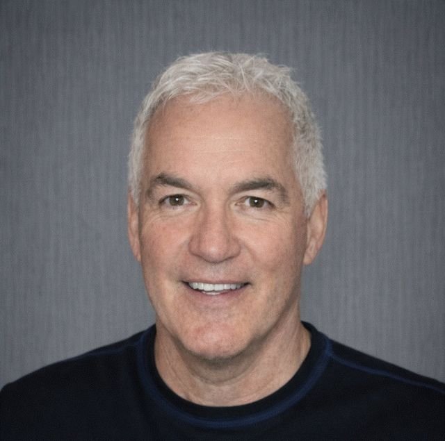 Portrait of Andre Fournier, founder of J&J Masonry and custom woodworking specialist.